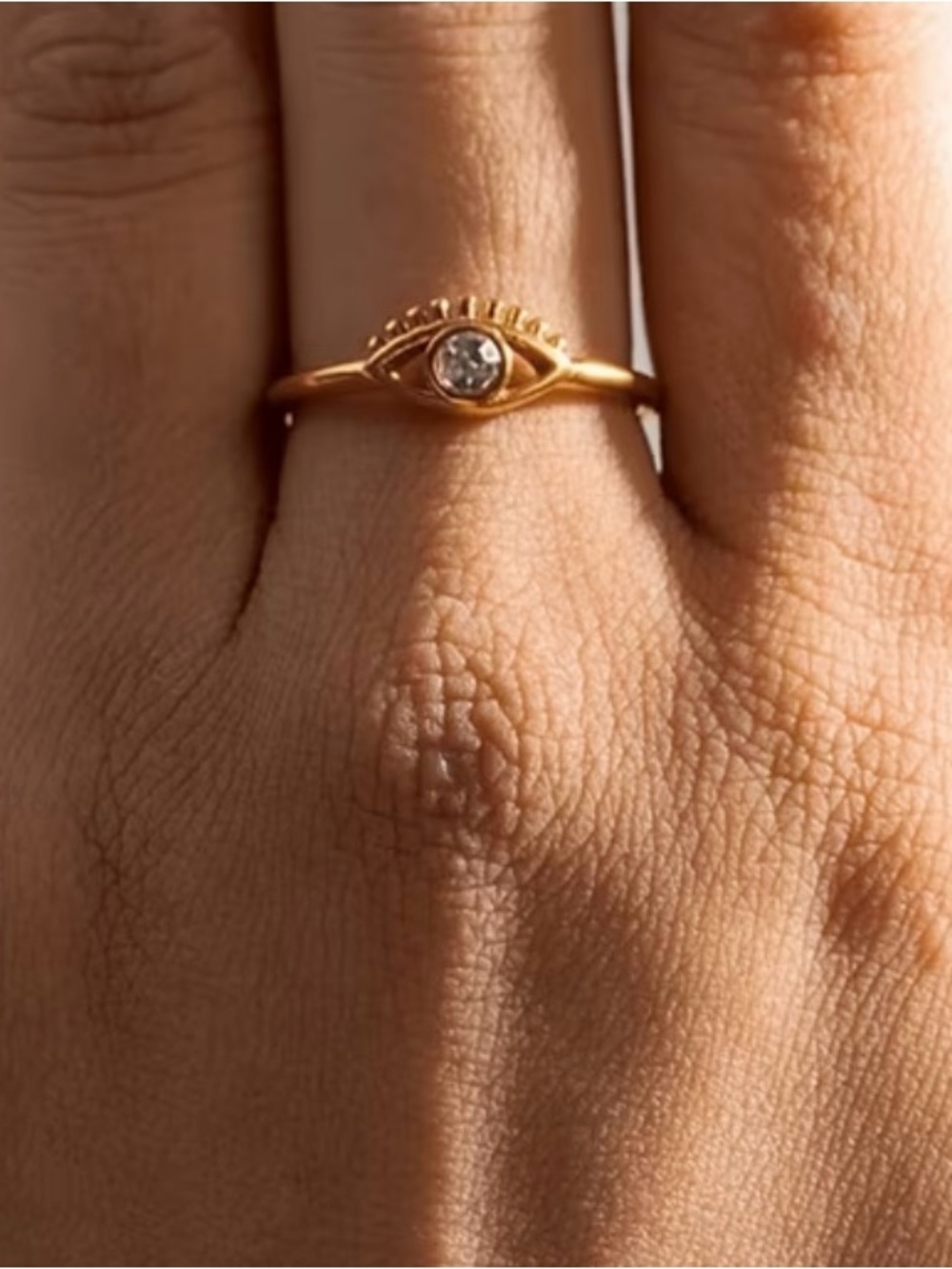Gold-Tone Eye Solitaire Ring with Clear Stone - Adjustable